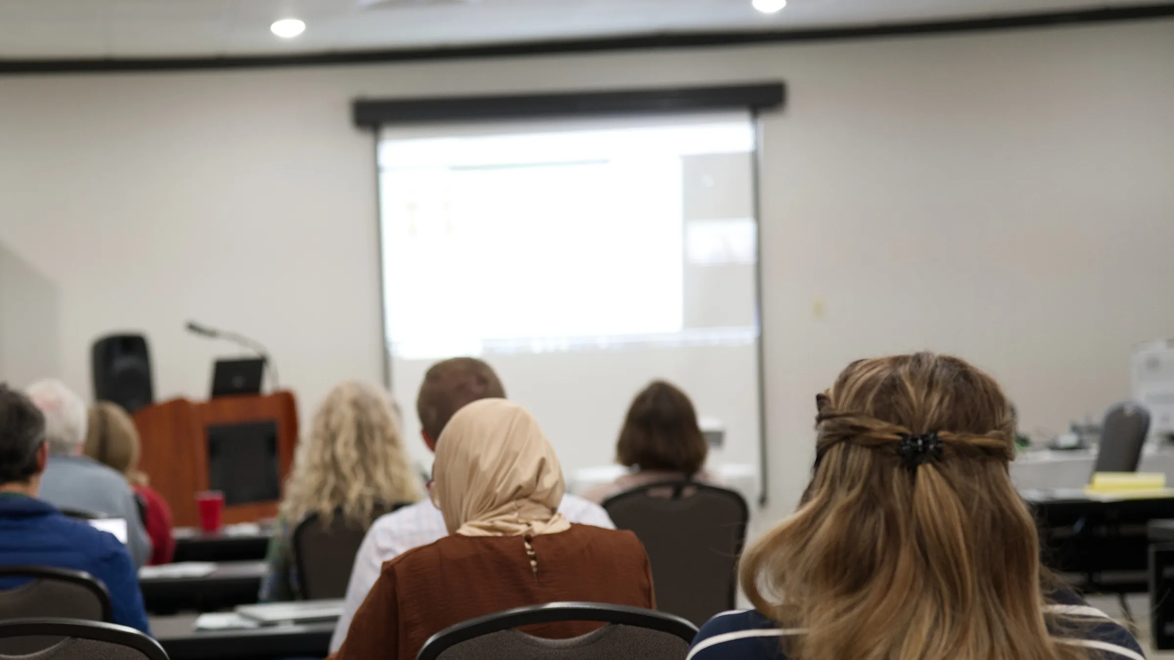 Attendees listening to a session at the THERA annual conference